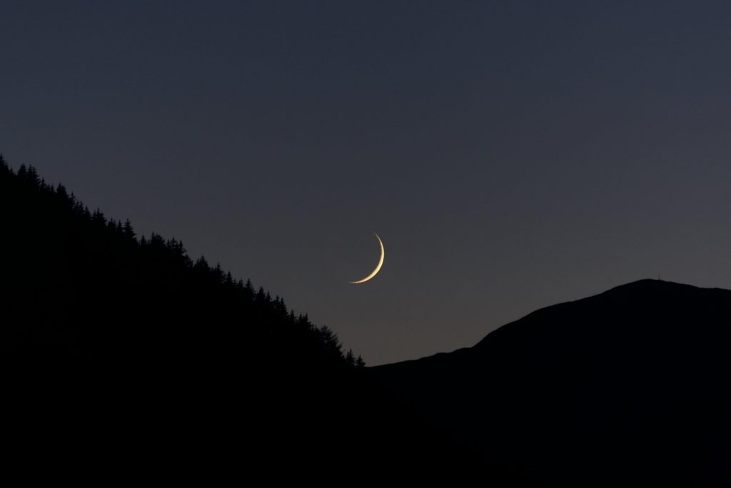 Moon over hills
